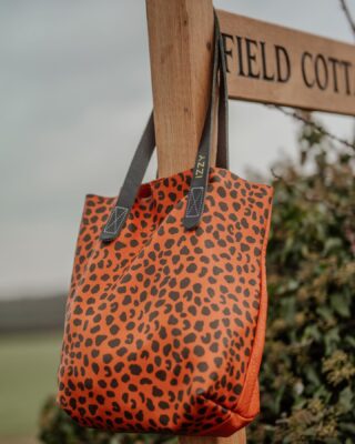 Let me tell you a little about our mini tote bag ! 
Hands down it a brilliant bag ! I have 2 bags this and my Amberley tote and I’ve had so much from each of them! 
I use my leopard mini tote every day pretty much as it’s the perfect size. 
I absolutely batter her …. And she still looks beautiful! 
That’s because the leather we use is untreated natural and buttery soft and will patina like a fine wine getting better with age !
The front is a gorgeous leopard print and the back is plain so it’s a great reversible style depending on your mood !
I also get tons of compliments ! Where did you get your bag ? And you know … I get that great feeling when I tell people it’s a bag I design and make 😊
A bag should be for life and this one is a winner ! 
I wouldn’t be without mine !