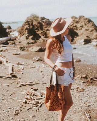 The beautiful @biancarebeccaowen with our leopard mini tote.  This is a great bag … stylish ….good size … reversible so you get 2 looks! Leopard print/plain sienna leather. And did I mention how amazingly soft it feels ? It’s a gorgeous accessory wear it to the office or beach ! Your choice ❤️